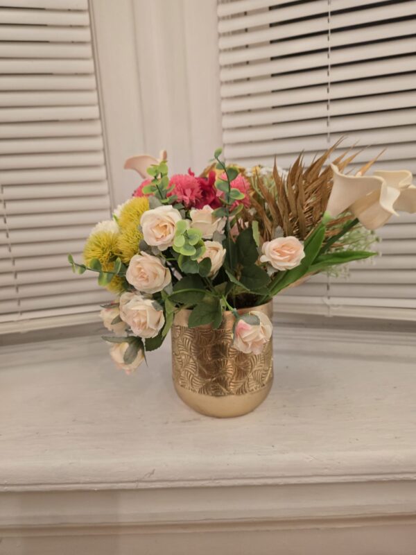 WhatsApp Image 2026-01-23 at 21.30.37 Golden Blush Floral Arrangement in Textured Gold Vase